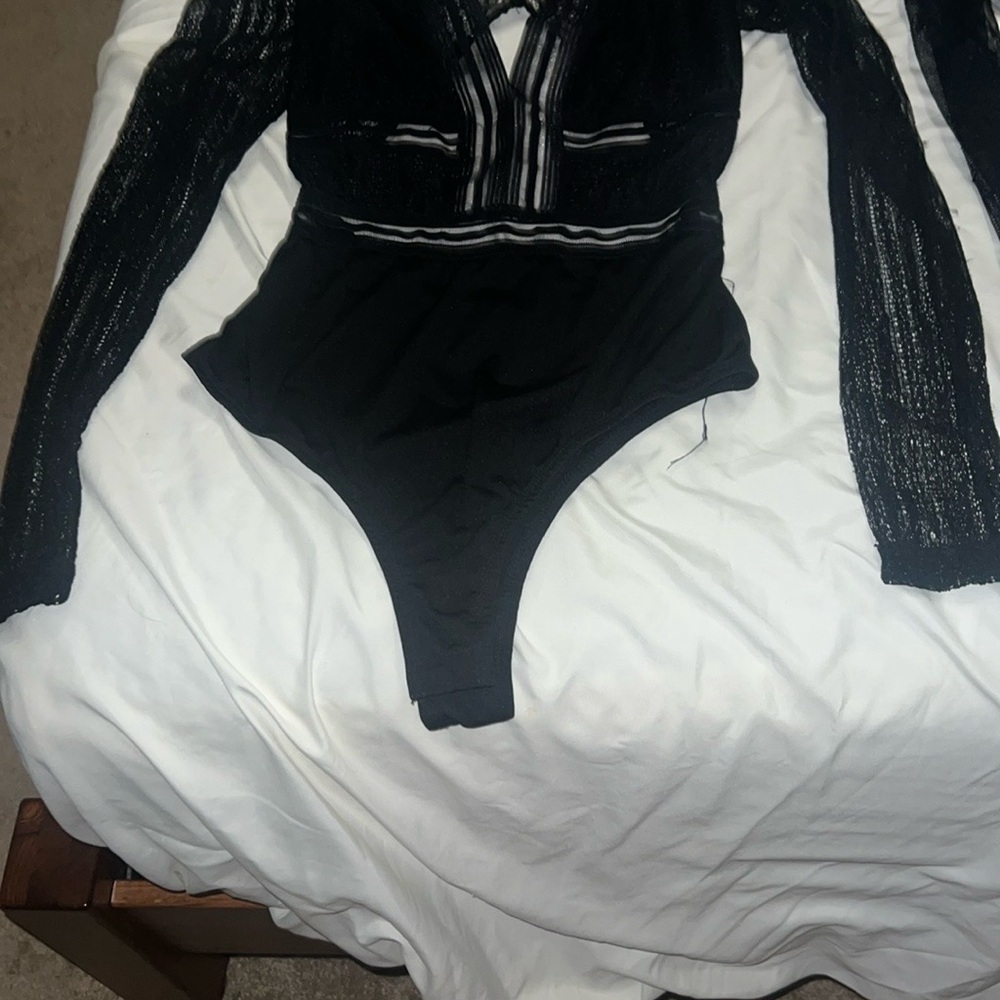 2 Black Long Sleeve Bodysuit with lace details. both size smalls.